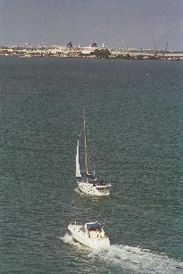 Sailboat and cabin cruiser on Biscayne Bay
